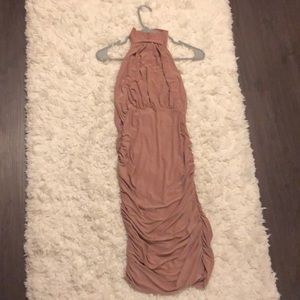 Open back nude bodycon.